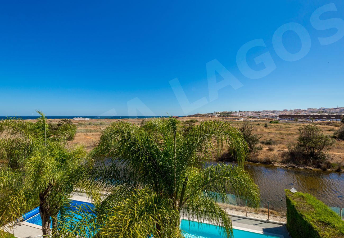 Casa geminada em Lagos - Casa Vista Lago